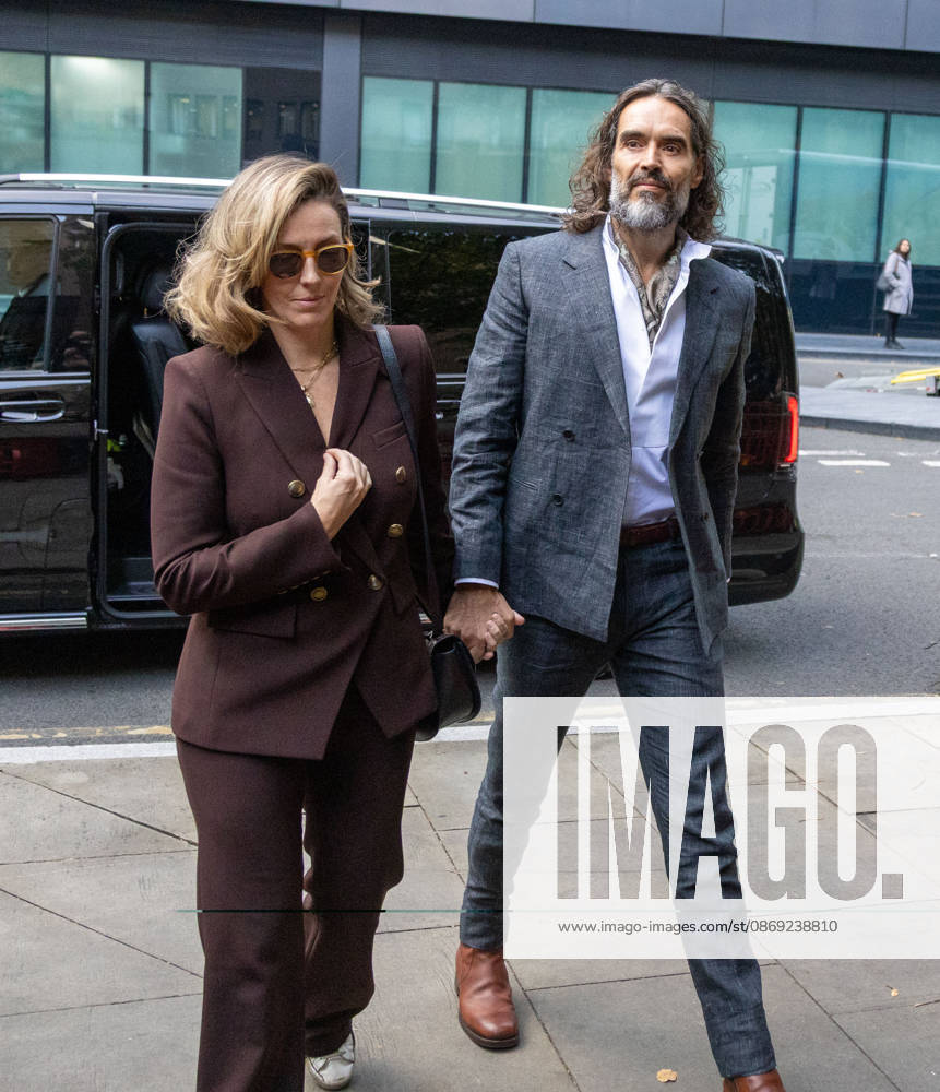 RUSSELL BRAND with his wife LAURA arrives at Southwark Crown Court, where he is facing three charges of rape, indecent assault, and three counts of sexual assault, relating to six women. London United Kingdom - ZUMAs262 20261012_zip_s262_017
