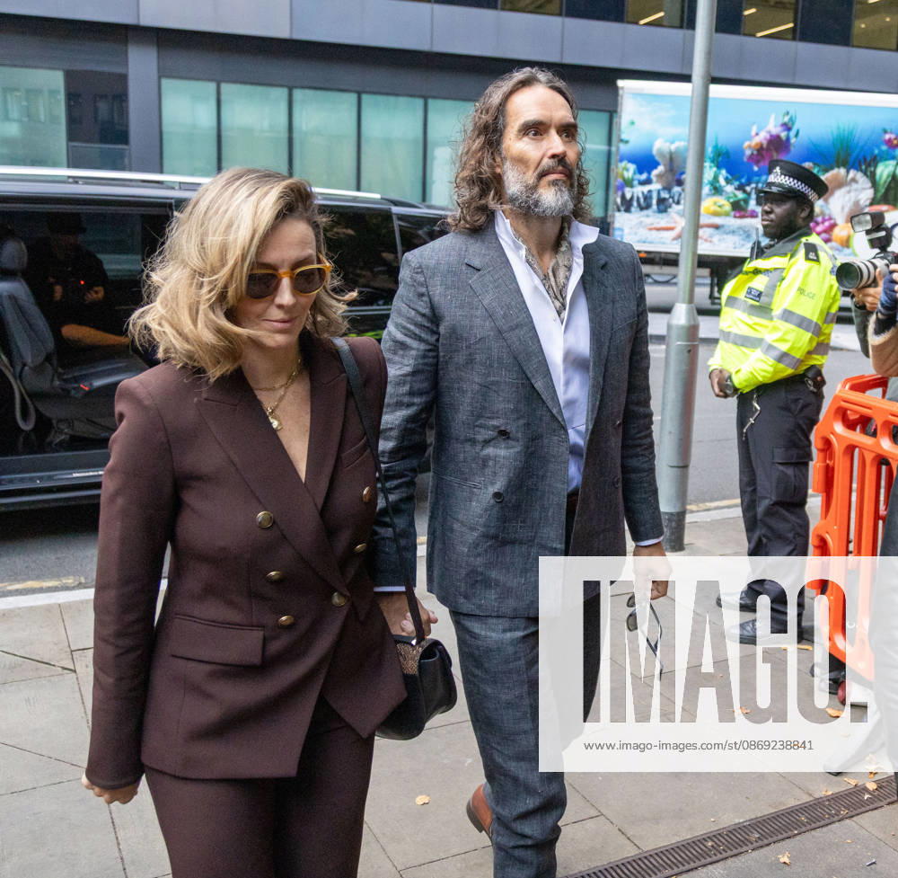 RUSSELL BRAND with his wife LAURA arrives at Southwark Crown Court, where he is facing three charges of rape, indecent assault, and three counts of sexual assault, relating to six women. London United Kingdom - ZUMAs262 20261012_zip_s262_020