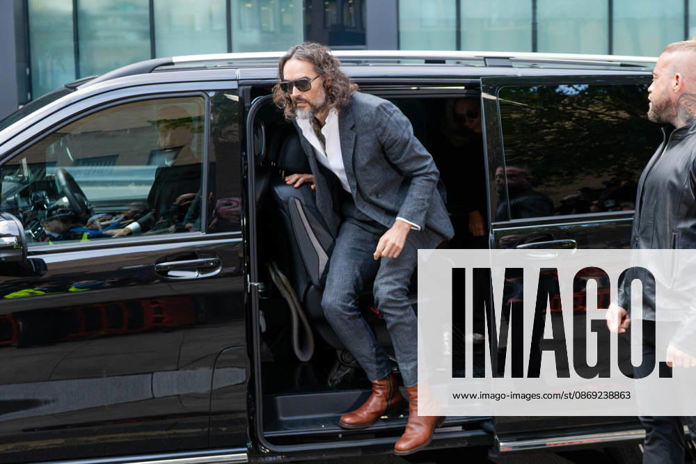Actor and comedian Russell BRAND arrives at Southwark Crown Court in London, United Kingdom, on October 12, 2026, as his trial begins on charges of rape, sexual assault and indecent assault. BRAND denies all the charges and has pleaded not guilty. London United Kingdom - ZUMAk172 20261012_zip_k172_004