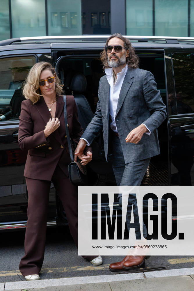 Actor and comedian Russell BRAND arrives at Southwark Crown Court with his wife, Laura, in London, United Kingdom, on October 12, 2026, as his trial begins on charges of rape, sexual assault and indecent assault. BRAND has pleaded not guilty to all charges. London United Kingdom - ZUMAk172 20261012_zip_k172_005