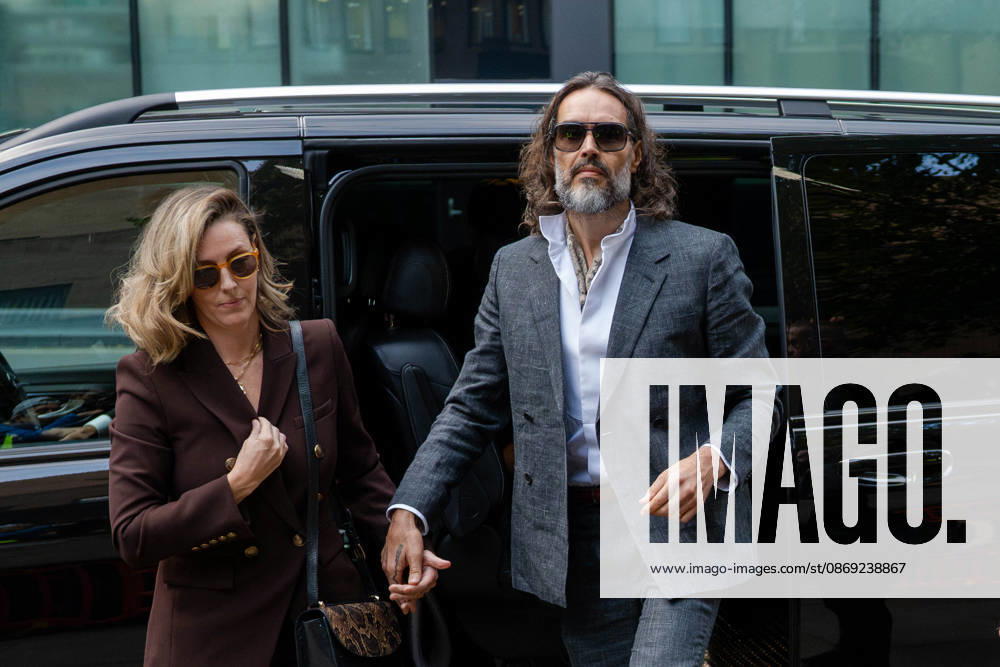 Actor and comedian Russell BRAND arrives at Southwark Crown Court with his wife, Laura, in London, United Kingdom, on October 12, 2026, as his trial begins on charges of rape, sexual assault and indecent assault. BRAND has pleaded not guilty to all charges. London United Kingdom - ZUMAk172 20261012_zip_k172_006