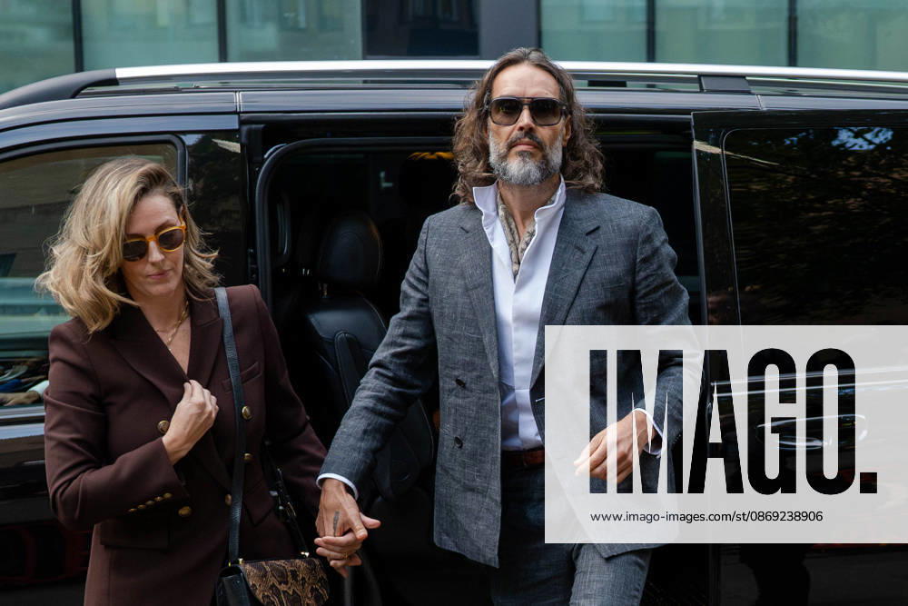 Actor and comedian Russell BRAND arrives at Southwark Crown Court with his wife, Laura, in London, United Kingdom, on October 12, 2026, as his trial begins on charges of rape, sexual assault and indecent assault. BRAND has pleaded not guilty to all charges. London United Kingdom - ZUMAk172 20261012_zip_k172_011