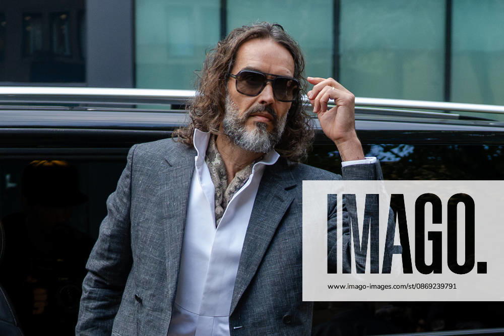 Actor and comedian Russell BRAND arrives at Southwark Crown Court in London, United Kingdom, on October 12, 2026, as his trial begins on charges of rape, sexual assault and indecent assault. BRAND denies all the charges and has pleaded not guilty. London United Kingdom - ZUMAk172 20261012_zip_k172_023