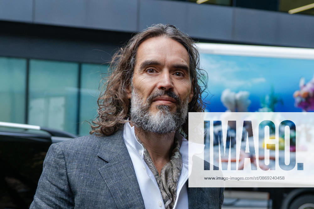 Actor and comedian Russell BRAND arrives at Southwark Crown Court in London, United Kingdom, on October 12, 2026, as his trial begins on charges of rape, sexual assault and indecent assault. BRAND denies all the charges and has pleaded not guilty. London United Kingdom - ZUMAk172 20261012_zip_k172_035