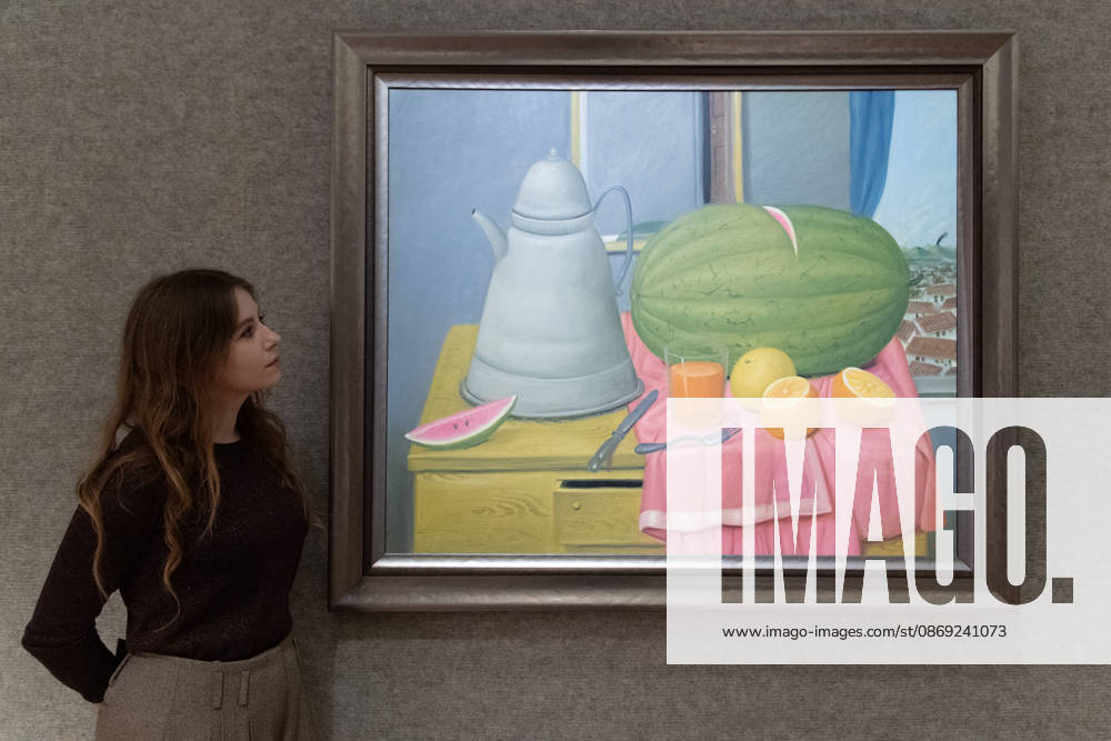 Bonhams 20th 21st Century Art Day Evening Sales Highlights Photocall - Bonhams, London, UK - 12 October, 2026 A staff member views Still Life with Watermelon by Fernando Botero (est. £220k - £350k) as part of Bonhams 20th 21st Century Art Day Evening Sales which is to go on auction from 15th - 16th October 2026 at Bonhams in London, England, UK on Monday 12 October, 2026., Credit:Justin Ng Avalon UK, England, London, Bonhams