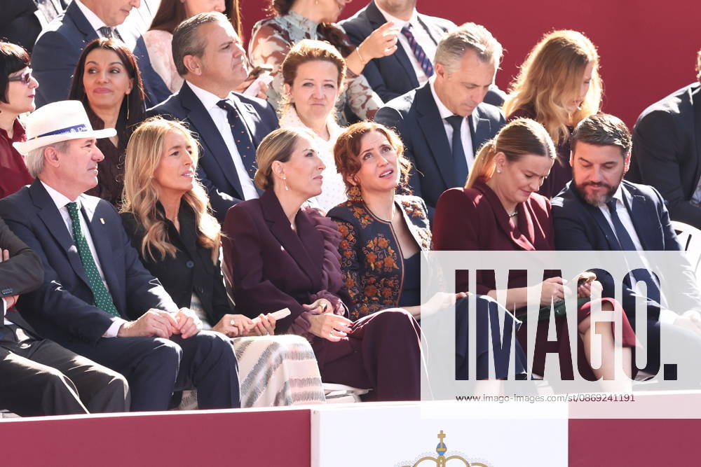 October 12 Parade for Hispanic Heritage Day: The president of the Regional Government of Extremadura, María Guardiola 3i, and the president of the Community of Madrid, Isabel Díaz Ayuso 3d, and the president of the Balearic Government, Marga Prhoens (2d), during the solemn ceremony honoring the national flag and the military parade for October 12, Hispanic Heritage Day, in the Plaza de Cánovas del Castillo, on October 12, 2026, in Madrid, Spain. The events begin with the raising of the flag and are followed by a tribute to those who gave their lives for the country. Subsequently, the military air and ground parades begin. Approximately 4,400 members of the Armed Forces, the security forces, and various civilian public institutions are part