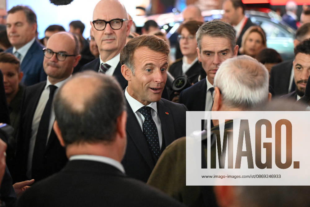 French President Emmanuel Macron, accompanied by Luc Chatel and Roland Lescure, Minister of the Economy, Finance, and Industrial, Energy, and Digital Sovereignty, attends the 2026 Paris Motor Show at Paris Expo · Porte de Versailles in Paris, France, on October 12, 2026. Lionel Urman Bestimage French President Emmanuel Macron at the international Paris Motor Show at the Porte de Versailles in Paris, France, on October 12, 2026. Paris, France