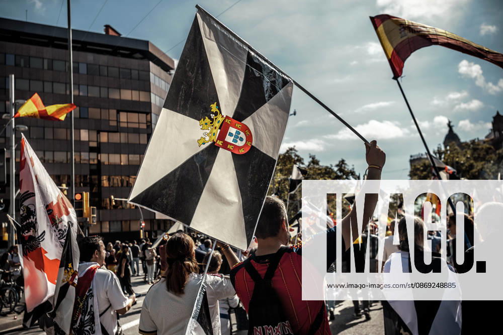 Demonstrators wave flags of Ceuta during a rally marking Spainâ€⠢s National Day. Barcelona Spain - ZUMAo105 20261012_fap_o105_022