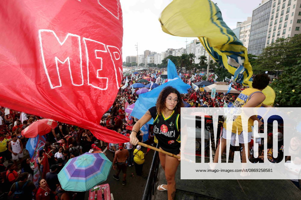 Thousands of supporters gather in Copacabana, Rio de Janeiro, Brazil, on October 12, 2026, for a pro-democracy demonstration organized by the CENA Nacional movement, the National Union of Students (UNE) and Universibloco. Held on Brazilâ€⠢s Our Lady of Aparecida national holiday, the rally calls for the defense of constitutional rights and public policies supporting healthcare, education and social assistance. Carnival street bands, known as blocos, and percussion groups brought music and a festive atmosphere to the waterfront mobilization, blending political activism with Rioâ€⠢s popular street culture. The demonstration takes place ahead of Brazilâ€⠢s October 25 pres - ZUMAport 20261012_znp_k251_010