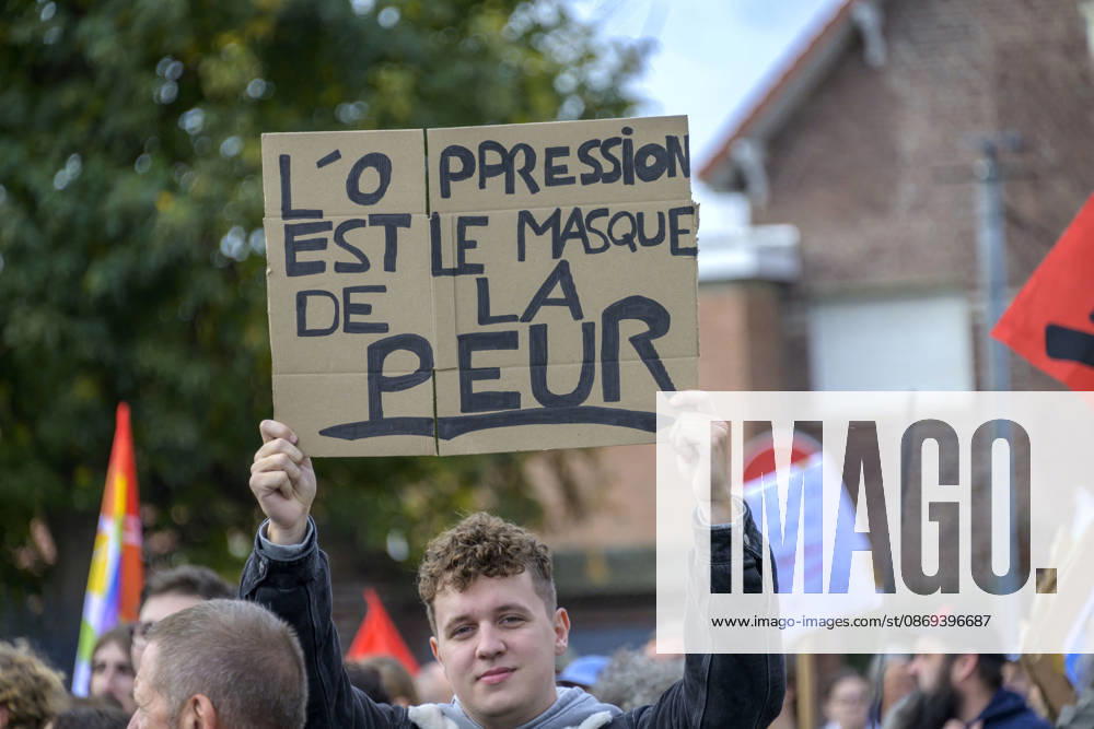 High School Students Demonstrate With Marine Tondelier In Lens - France High school students from Lens participate in a protest march through the streets of Lens, Pas de Calais, France on October 13, 2026, accompanied by political figures, teachers, and union representatives. Slogans displayed include L oppression est le masque de la peur (Oppression is the mask of fear). Photo by Blanquart C ANDBZ ABACAPRESS.COM Lens Hauts-de-France France