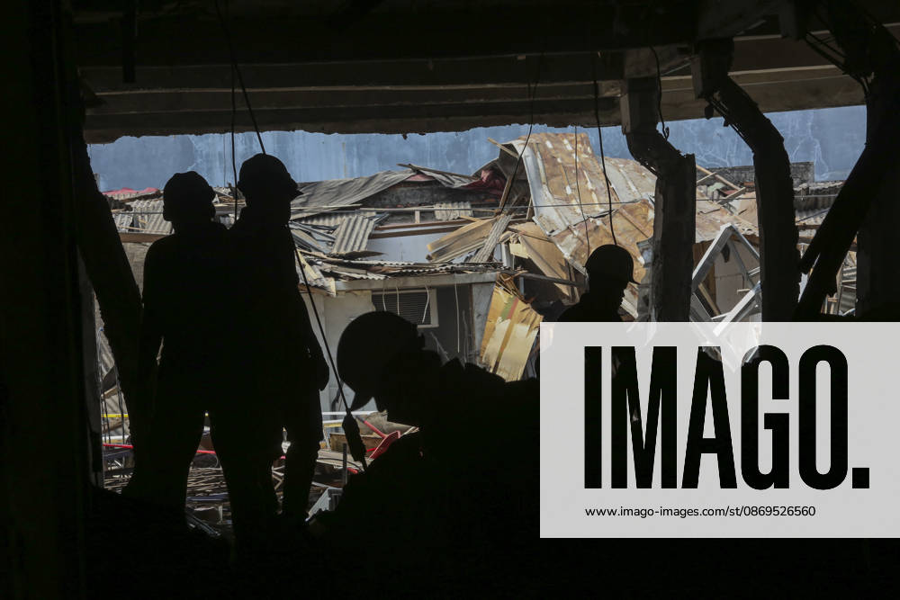 Blast at Indonesian market kills 2, injures 11 in South Tangerang BANTEN, INDONESIA - OCTOBER 15: Police officers investigate the scene of an explosion at a market in South Tangerang, on the outskirt of Jakarta, Indonesia, on October 15, 2026. The blast killed two people and injured at least 11 others, according to police. Investigators are examining the cause of the explosion after finding an ethylene gas cylinder at the site. The blast damaged shop-house buildings and scattered debris across the surrounding commercial area. Agoes Rudianto Anadolu Banten Indonesia. Editorial use only. Please get in touch for any other usage.