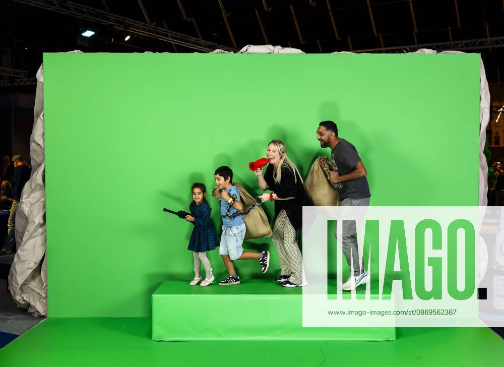 UTRECHT - Visitors pose for a photo on the first day of LEGO World at the Jaarbeurs. For seven days, young and old can have fun with the building toys. REMKO DE WAAL ANP netherlands out - belgium out