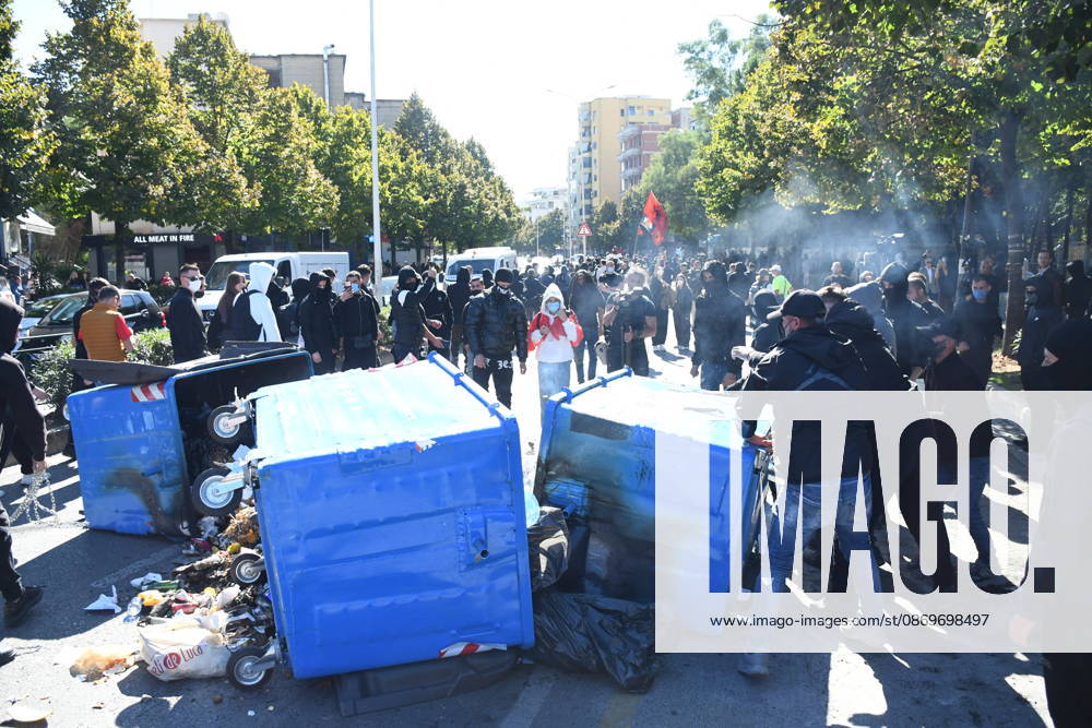 Demonstrations organized by students demanding improvements to their educational conditions continue in Albania TIRANA, ALBANIA - OCTOBER 16: Demonstrators block streets using trash dumpsters and light fires during escalating student protests demanding better educational conditions and lower tuition costs in Tirana, Albania on October 16, 2026. Police forces intervened to clear burning barricades along major boulevards as university student actions intensified across the capital. Olsi Shehu Anadolu Tirana Albania. Editorial use only. Please get in touch for any other usage.