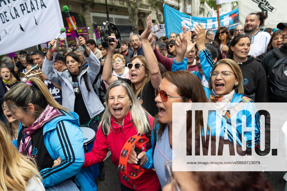 Teachers sing during the march towards Argentinas National Congress to demand compliance with the University Budget Law. Buenos Aires Argentina - ZUMAp265 20261016_zip_p265_036