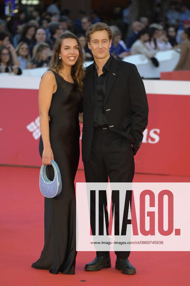 Alexander Fehling (r and new girl friend (r) attend the red carpet for the film LEurotrashi at the 2026 Rome Film Fest, held at the Auditorium Parco della Musica. Rome Italy - ZUMAs197 20261016_aaa_s197_286