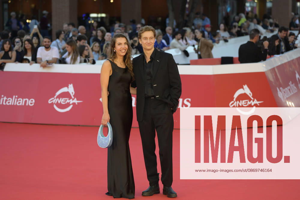 Alexander Fehling (r and new girl friend (r) attend the red carpet for the film LEurotrashi at the 2026 Rome Film Fest, held at the Auditorium Parco della Musica. Rome Italy - ZUMAs197 20261016_aaa_s197_306