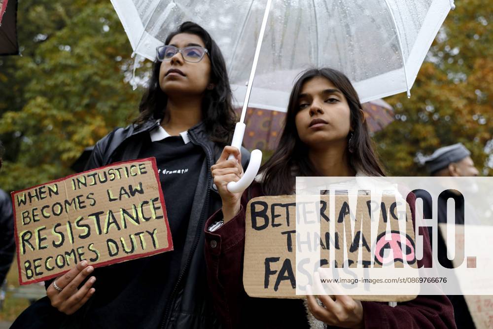BERLIN, GERMANY - OCTOBER 17, 2026: A small group of demonstrators hold placards at Oranienplatz in the Kreuzberg district to show solidarity with mass protests in India and to protest against the crackdown on them, as several people take the floor to discuss the situation. The demonstration followed a call by Neha Bora, president of the All India Studentsâ€⠢ Association (AISA), for people everywhere to back the protests, saying â€oeeverywhere is Jantar Mantarâ€Â, the site in Delhi where the main protests are taking place. The protests demand the resignation of Chief Election Commissioner Gyanesh Kumar over a revision of electoral rolls that opponents say led to the mass deletion of voters, whi - ZUMAq101 20261017_zna_q101_067