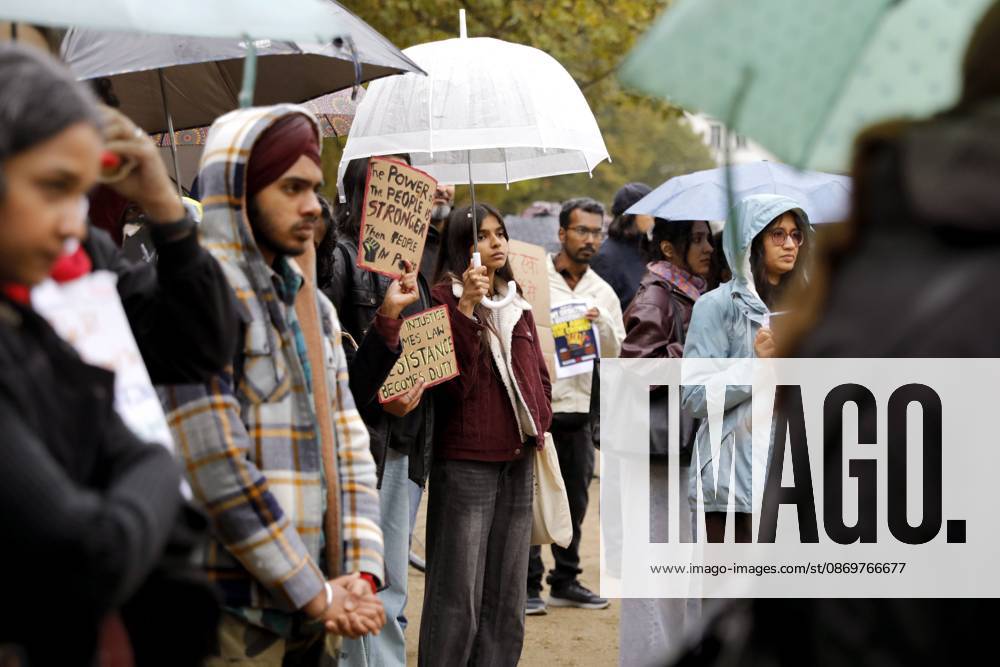 BERLIN, GERMANY - OCTOBER 17, 2026: A small group of demonstrators hold placards at Oranienplatz in the Kreuzberg district to show solidarity with mass protests in India and to protest against the crackdown on them, as several people take the floor to discuss the situation. The demonstration followed a call by Neha Bora, president of the All India Studentsâ€⠢ Association (AISA), for people everywhere to back the protests, saying â€oeeverywhere is Jantar Mantarâ€Â, the site in Delhi where the main protests are taking place. The protests demand the resignation of Chief Election Commissioner Gyanesh Kumar over a revision of electoral rolls that opponents say led to the mass deletion of voters, whi - ZUMAq101 20261017_zna_q101_068