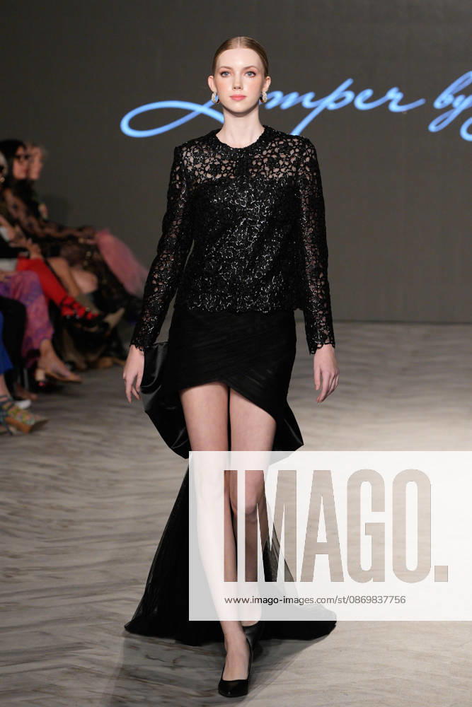 (261018) -- VANCOUVER, Oct. 18, 2026 -- A model presents a creation by Chinese fashion designer Jumper Zhang during Vancouver Fashion Week 2026 in Vancouver, British Columbia, Canada, on Oct. 17, 2026. (Photo by Liang Sen Xinhua) CANADA-VANCOUVER FASHION WEEK 2026 LinxWei