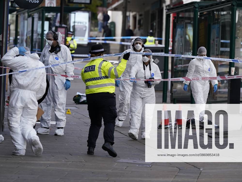 Forensic investigators examine scene after police officer shot in Nottingham NOTTINGHAM, UNITED KINGDOM - OCTOBER 18: Forensic investigators in protective suits examine a cordoned-off crime scene as police officers secure the area after a police office was shot early in the morning on October 18, 2026, in Nottingham, United Kingdom. The scene remains cordoned off following a reported shooting involving a police officer earlier in the morning. A police officer was shot after approaching two people earlier in the morning and was taken to hospital for treatment, according to Nottinghamshire Police. Giannis Alexopoulos Anadolu Nottingham United Kingdom. Editorial use only. Please get in touch for any other usage.