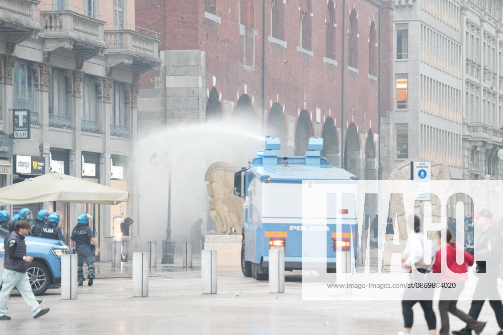 IPA89867038 - Milan: Clashes and looting by hooded youths continued in the city center the day after the demonstration on Saturday, the 17th; many hooded individuals were detained and taken to police headquarters.