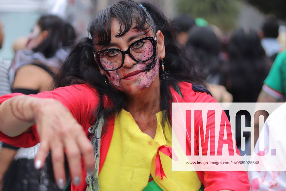 19th annual Zombie Walk Mexico 2026 MEXICO CITY, MEXICO - OCTOBER 18, 2026: Participants in the 19th annual Zombie Walk Mexico 2026, dressed as the living dead, monsters, and horror characters, gather at the Monument to the Revolution in Mexico City. Mexico City Mexico