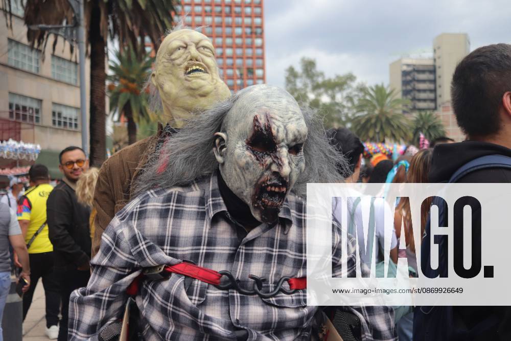 19th annual Zombie Walk Mexico 2026 MEXICO CITY, MEXICO - OCTOBER 18, 2026: Participants in the 19th annual Zombie Walk Mexico 2026, dressed as the living dead, monsters, and horror characters, gather at the Monument to the Revolution in Mexico City. Mexico City Mexico