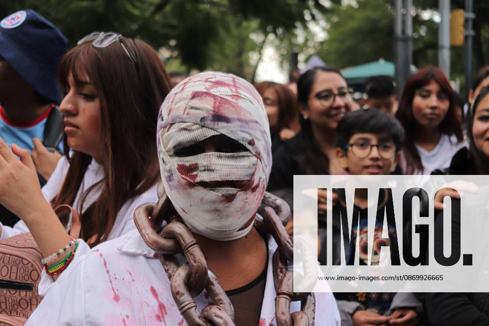 19th annual Zombie Walk Mexico 2026 MEXICO CITY, MEXICO - OCTOBER 18, 2026: Participants in the 19th annual Zombie Walk Mexico 2026, dressed as the living dead, monsters, and horror characters, gather at the Monument to the Revolution in Mexico City. Mexico City Mexico
