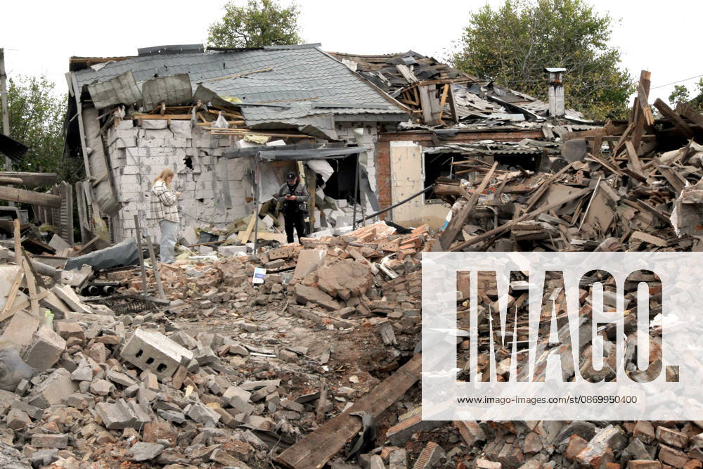 A man and a woman stand among the rubble near a house damaged by a Russian bombardment in Dnipro, Ukraine, October 19, 2026. On Monday morning, Russian forces launched guided aerial bombs at the eastern city, damaging private homes and infrastructure. An 84-year-old woman was hospitalised in moderate condition. (Photo by Mykola Miakshykov Ukrinform) Russian troops hit Dnipro with guided bombs