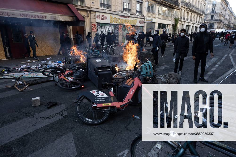 PARIS, FRANCE - OCTOBER 18, 2026: Protesters clash with police near Place de la RÃ publique in Paris during a protest against austerity. Protesters set up makeshift barricades and start fires in the square and surrounding streets. After police clear the square, protesters attack nearby shops. Paris France - ZUMAq101 20261018_zna_q101_294