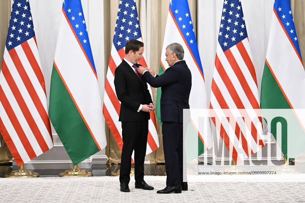 US Secretary of State Marco Rubio in Uzbekistan SAMARKAND, UZBEKISTAN - OCTOBER 19 : (---- - MANDATORY CREDIT - UZBEKISTAN PRESIDENCY HANDOUT - NO MARKETING NO ADVERTISING CAMPAIGNS - DISTRIBUTED AS A SERVICE TO CLIENTS----) Uzbek President Shavkat Mirziyoyev (R) presents the Order of Friendship ( Dostlik ) to US Secretary of State Marco Rubio (L) who arrived to attend the C5+1 Central Asia-US Foreign Ministers Meeting and the second meeting of the Uzbekistan-US Business and Investment Council in Samarkand, Uzbekistan on October 19, 2026. Uzbekistan Presidency Anadolu Samarkand Uzbekistan. Editorial use only. Please get in touch for any other usage.