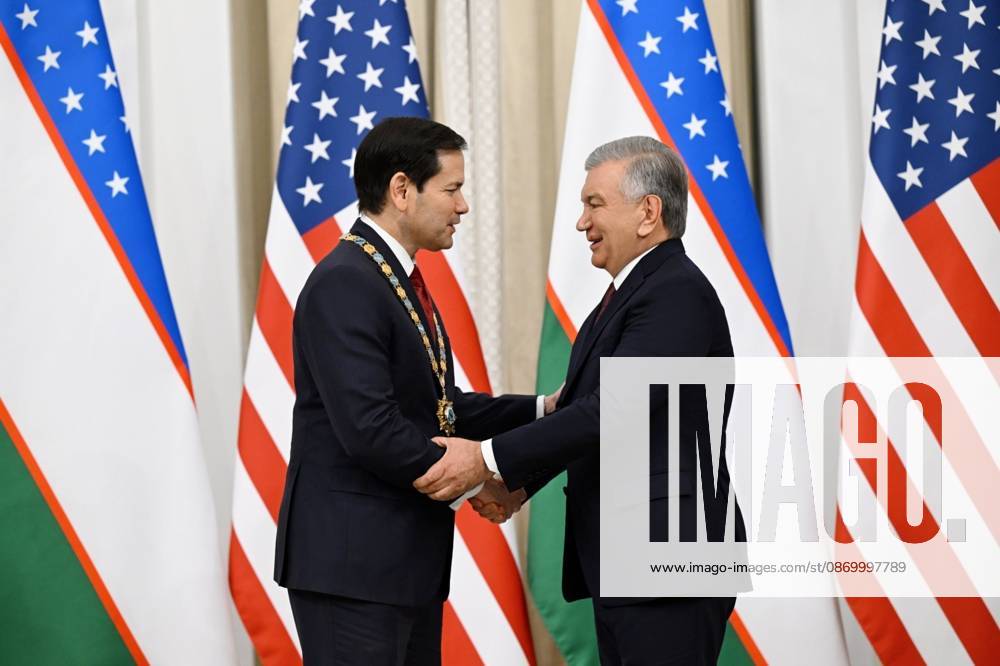 US Secretary of State Marco Rubio in Uzbekistan SAMARKAND, UZBEKISTAN - OCTOBER 19 : (---- - MANDATORY CREDIT - UZBEKISTAN PRESIDENCY HANDOUT - NO MARKETING NO ADVERTISING CAMPAIGNS - DISTRIBUTED AS A SERVICE TO CLIENTS----) Uzbek President Shavkat Mirziyoyev (R) presents the Order For Great Services to US Secretary of State Marco Rubio (L) who arrived to attend the C5+1 Central Asia-US Foreign Ministers Meeting and the second meeting of the Uzbekistan-US Business and Investment Council in Samarkand, Uzbekistan on October 19, 2026. Uzbekistan Presidency Anadolu Samarkand Uzbekistan. Editorial use only. Please get in touch for any other usage.