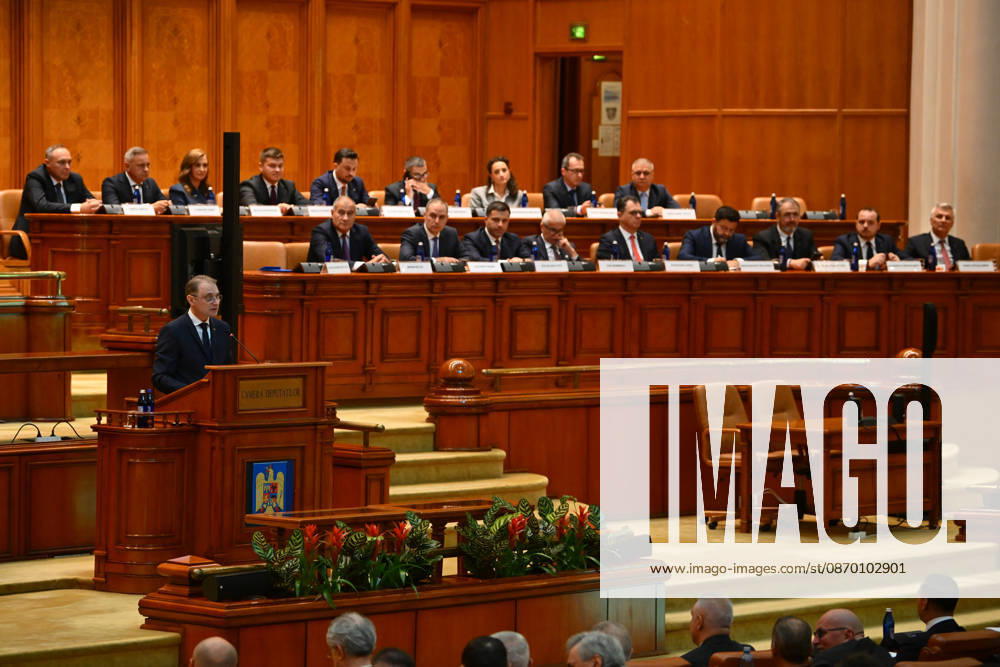 Plenary session of the Romanian Parliament in Bucharest BUCHAREST, ROMANIA - OCTOBER 20: Prime Minister-designate Luca Niculescu, proposed by President of Romania Nicusor Dan, addresses a joint plenary session of the Romanian Parliament at the Palace of the Parliament in Bucharest, Romania on October 20, 2026. Niculescu presented his governing platform, fiscal reform agenda, and proposed cabinet lineup to lawmakers ahead of the vote of confidence. Alex Nicodim Anadolu Bucharest Romania. Editorial use only. Please get in touch for any other usage.