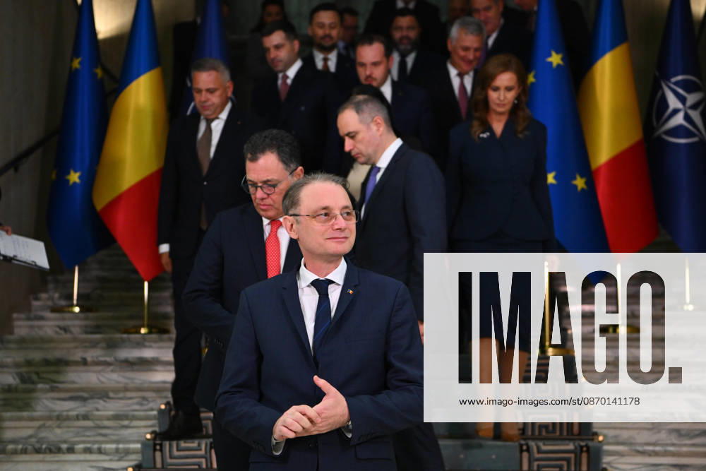 Romania s Parliament approves new Niculescu government BUCHAREST, ROMANIA - OCTOBER 20 : Prime Minister of Romania Luca Niculescu and members of the Romanian Parliament, including Deputy Prime Minister and Minister of Internal Affairs Marian Neacsu, Minister of Transport and Infrastructure Stefan-Ovidiu Popa, Minister of Justice Radu Marinescu, Minister of National Defence Stefan-Radu Oprea, Minister of Economy, Digitalization, Entrepreneurship, and Tourism Daniel-Catalin Zamfir, Minister of Agriculture and Rural Development Florin-Ionut Barbu, Minister of Environment, Waters, and Forests Natalia-Elena Intotero, Minister of Development, Public Works, and Administration Marcel-Alexandru Stoica, Minister of Investments and European Projects A