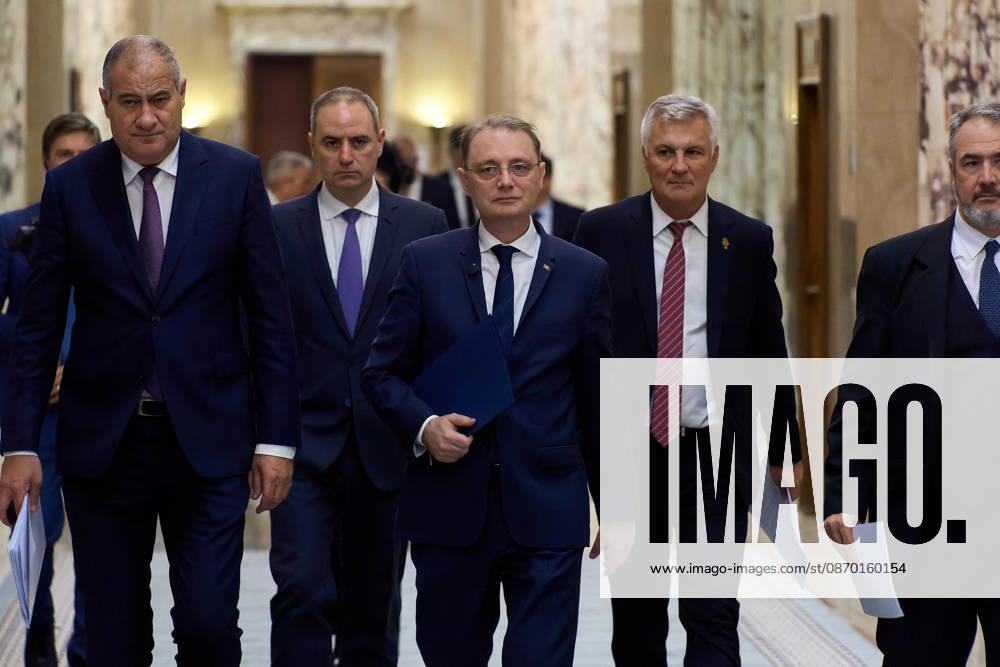Bucharest, Romania. 20th Oct, 2026: Luca Niculescu, Prime Minister of Romania, followed by his cabinet, arrives for the government meeting at Victoria Palace, the Romanian Government headquarters. Bucharest Romania