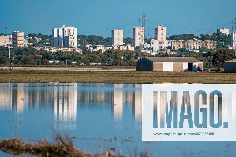 FLOODING IN THE GARD PHOTOPQR LE MIDI LIBRE MiKAEL ANISSET NIMES 10 21 2026 GARD OCTOBER 21, 2026 THE DAY AFTER THE FLOODING MEDITERRANEAN WEATHER EVENT SEVERE WEATHER THE Nîmes Plain in the Background, the Pissevin Towers Nîmes, France, October 21, 2026 Flooding following heavy rainfall has affected several areas of the city after the Vistre River overflowed its banks NÎMES GARD France