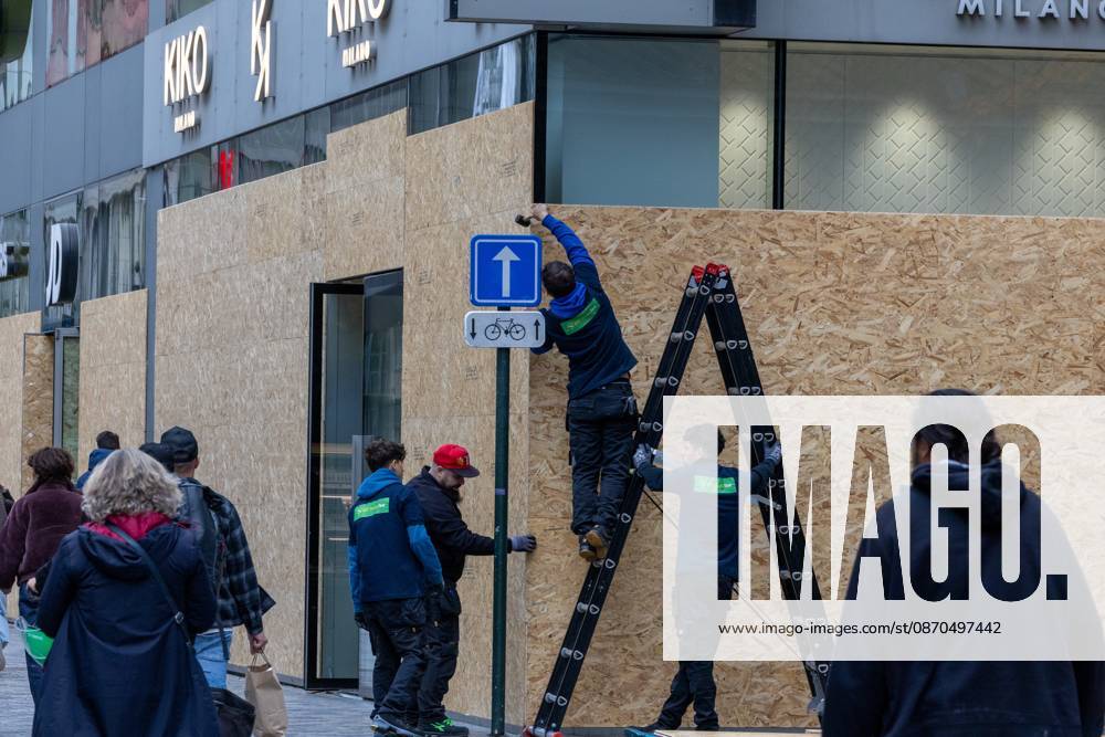 Storefronts boarded up with wooden panels at Rue Neuve Nieuwstraat, in Brussels, on Friday 23 October 2026. Stores are preparing for another protest scheduled for Saturday. NICOLASxMAETERLINCK 190739881