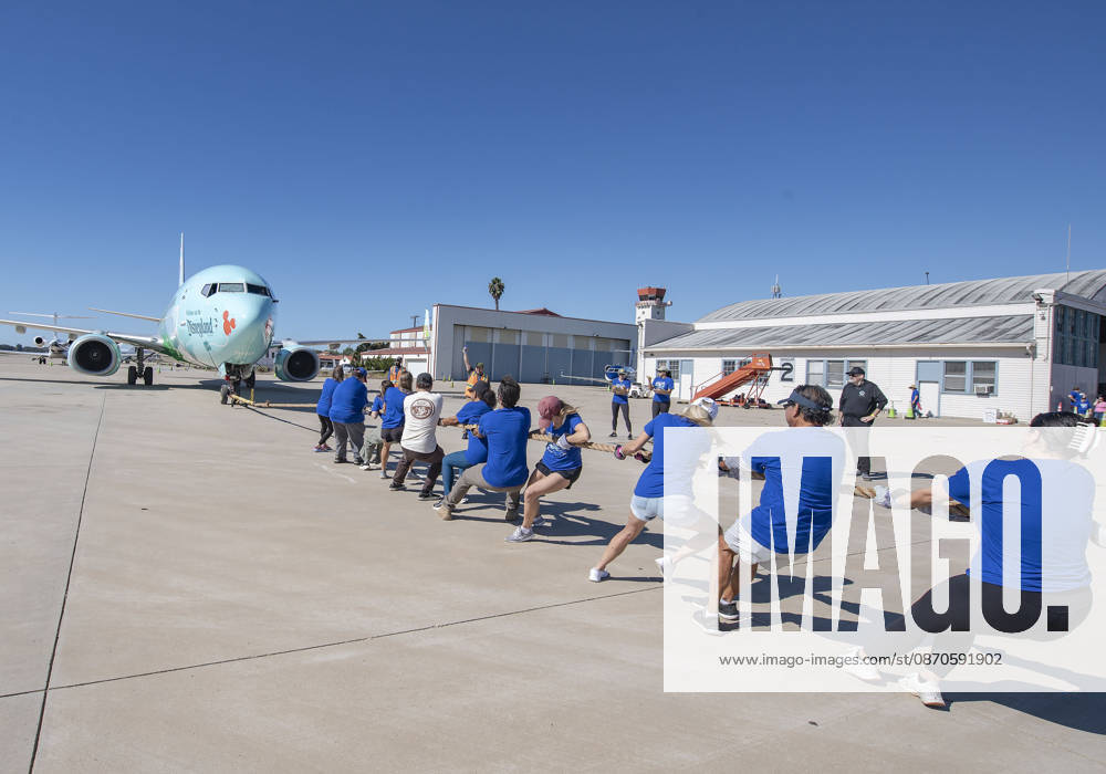 Teams compete in the 5th annual Alpha Resource Center Plane Pull, trying to pull a 140,000-pound Alaska Airlines 737 jetliner 20 feet in the fastest time. The event is a fundraiser for the Alpha Resource Center, a nonprofit serving people with disabilities and their families. Santa Barbara USA - ZUMAh13_ 20261024_zaf_h13_002