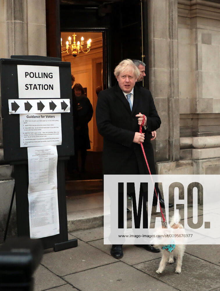 British Prime Minister Boris Johnson and his dog Dilyn leaves a Westminster polling station after casting his vote on Thursday, December 12, 2019. Mr Johnson is seeking a majority in the General Election on December 12th to enable the government to get Brexit passed. LON2019121201 HUGOxPHILPOTT
