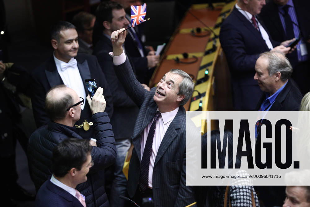 (200129) -- BRUSSELS, Jan. 29, 2020 -- Member of the European Parliament and Brexit Party Leader Nigel Farage waves a British flag after the vote on the Withdrawal Agreement at the plenary session of the European Parliament in Brussels, Belgium, on Jan. 29, 2020. The European Parliament voted overwhelmingly on Wednesday to approve the Withdrawal Agreement between the European Union (EU) and the United Kingdom. ) BELGIUM-BRUSSELS-EU PARLIAMENT-UK-BREXIT-WITHDRAWAL AGREEMENT-APPROVAL ZhengxHuansong