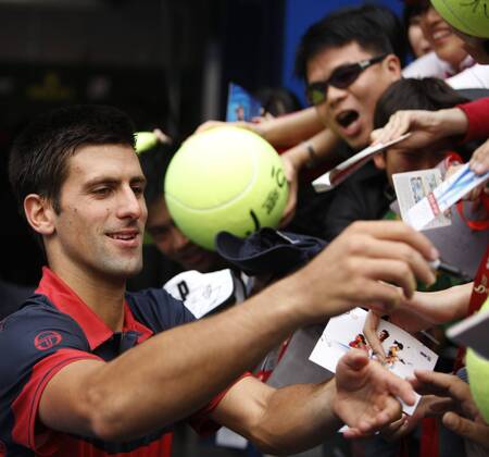 BEIJING, Oct. 9, 2010 - Novak Djokovic of Serbia signs autographs after the men s singles semifinal at the China Open tennis tournament in Beijing, capital of China, Oct. 9, 2010.