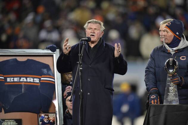 Former Chicago Bears tight end, head coach and Pro Football Hall of Famer Mike Ditka speaks during a halftime ceremony retiring his number 89 during the Chicago Bears Dallas Cowboys game at Soldier Field in Chicago on December 9, 2013. Ditka played from the Bears from 1961-1966 and coached the team from 1982-1992, winning Super Bowl XX in 1986.  CHI2013120923