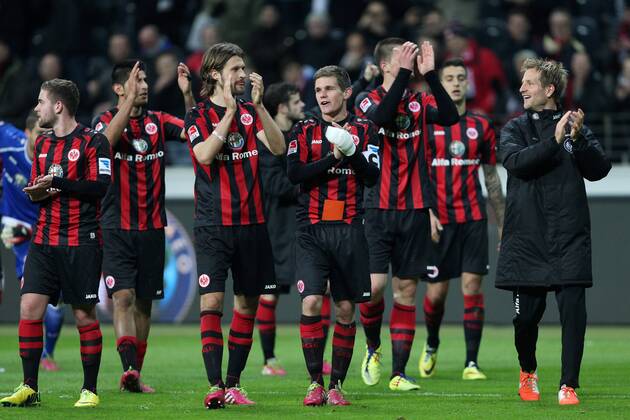 Die Spieler von Eintracht Frankfurt jubeln nach Spielende Fussball 1. Bundesliga, 27. Spieltag, Eintracht Frankfurt (F) - Borussia Mönchengladbach (MG) 1:0, am 26.03.2014 in Frankfurt Deutschland.