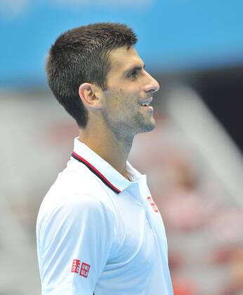 (141003) -- BEIJING, Oct. 3, 2014 -- Novak Djokovic of Serbia reacts during the men s quarterfinal match at the China Open tennis tournament in Beijing, China, Oct. 3, 2014. (SP)CHINA-BEIJING-TENNIS-CHINA OPEN LixWen