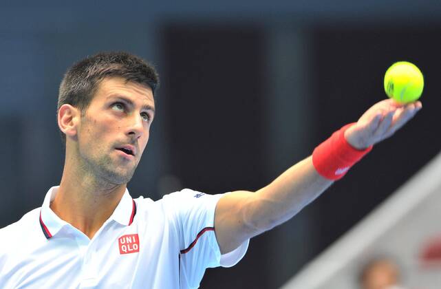 (141003) -- BEIJING, Oct. 3, 2014 -- Novak Djokovic of Serbia serves the ball during the men s quarterfinal match at the China Open tennis tournament in Beijing, China, Oct. 3, 2014. (SP)CHINA-BEIJING-TENNIS-CHINA OPEN LixWen