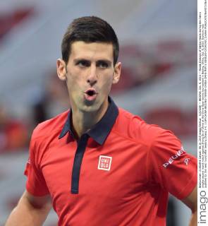 (151008) -- BEIJING, Oct. 8, 2015 -- Novak Djokovic of Serbia reacts during the men s singles second round match against Zhang Ze of China at the China Open tennis tournament in Beijing, China, Oct. 8, 2015. Djokovic was qualified for the next round after beating Zhang 2-0. ) (SP)CHINA-BEIJING-TENNIS-CHINA OPEN-MEN S SINGLES-DJOKOVIC LixWen