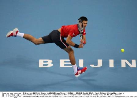 (151011) -- BEIJING, Oct. 11, 2015 -- Novak Djokovic of Serbia hits a return to Rafael Nadal of Spain during their men s singles final at 2015 China Open Tennis Tournament in Beijing, China, Oct. 11, 2015. Djokovic claimed the title of the event after beating Nadal 2-0. ) (SP)CHINA-BEIJING-TENNIS-CHINA OPEN-MEN S SINGLES-FINAL XingxGuangli