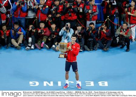 (151011) -- BEIJING, Oct. 11, 2015 -- Novak Djokovic of Serbia poses with his champion trophy during the awarding ceremony for the men s singles final at 2015 China Open Tennis Tournament in Beijing, China, Oct. 11, 2015. Djokovic claimed the title of the event after beating Rafael Nadal of Spain 2-0. ) (SP)CHINA-BEIJING-TENNIS-CHINA OPEN-MEN S SINGLES-FINAL WangxLili