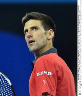 (151011) -- BEIJING, Oct. 11, 2015 -- Novak Djokovic of Serbia reacts during the men s singles final against Rafael Nadal of Spain at 2015 China Open Tennis Tournament in Beijing, China, Oct. 11, 2015. Djokovic claimed the title of the event after beating Nadal 2-0. ) (SP)CHINA-BEIJING-TENNIS-CHINA OPEN-MEN S SINGLES-FINAL LixWen