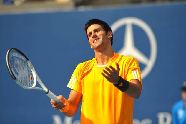 091009) -- BEIJING, Oct. 9, 2009 -- Novak Djokovic of Serbia reacts during the men s singles quarterfinal match against Fernando Verdasco of Spain at the China Open tennis tournament in Beijing, Oct. 9, 2009. Djokovic won the match 2-1... (Luo Xiaoguang) (txy (3)CHINA-BEIJING-TENNIS-CHINA OPEN-DJOKOVIC VS VERDASCO (CN) - ZUMAx10_